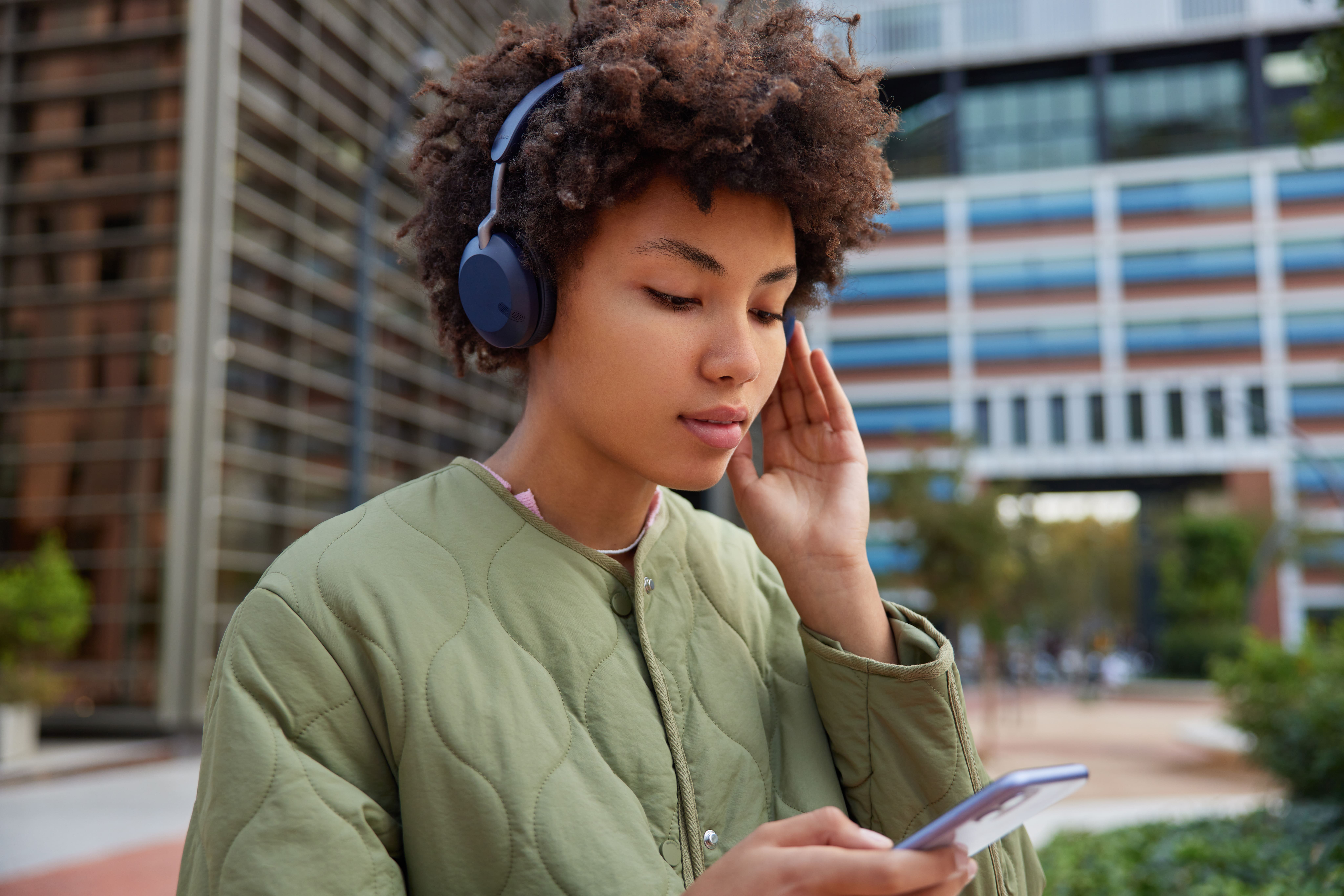 Person listening to headphones